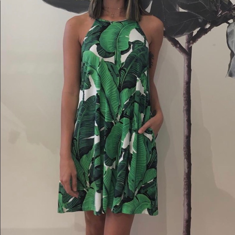 Ava Sky dress with pockets “Palmy print”